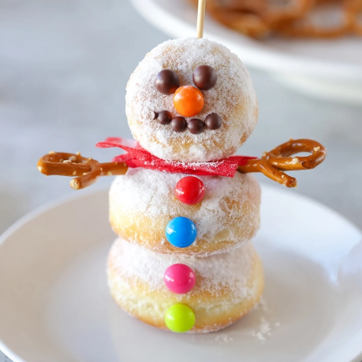 Close-up of adorable Mini Donut Snowman treats, perfect for winter snack time, delicious and easy to make.