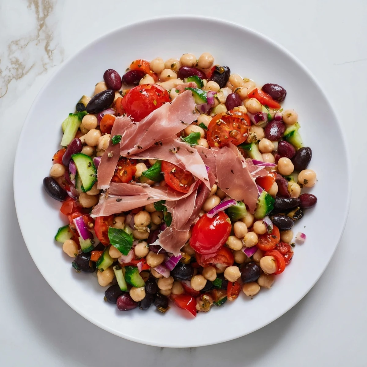 Vibrant Dense Bean Salad with Prosciutto: colorful veggies and salty prosciutto make an Italian-inspired salad.