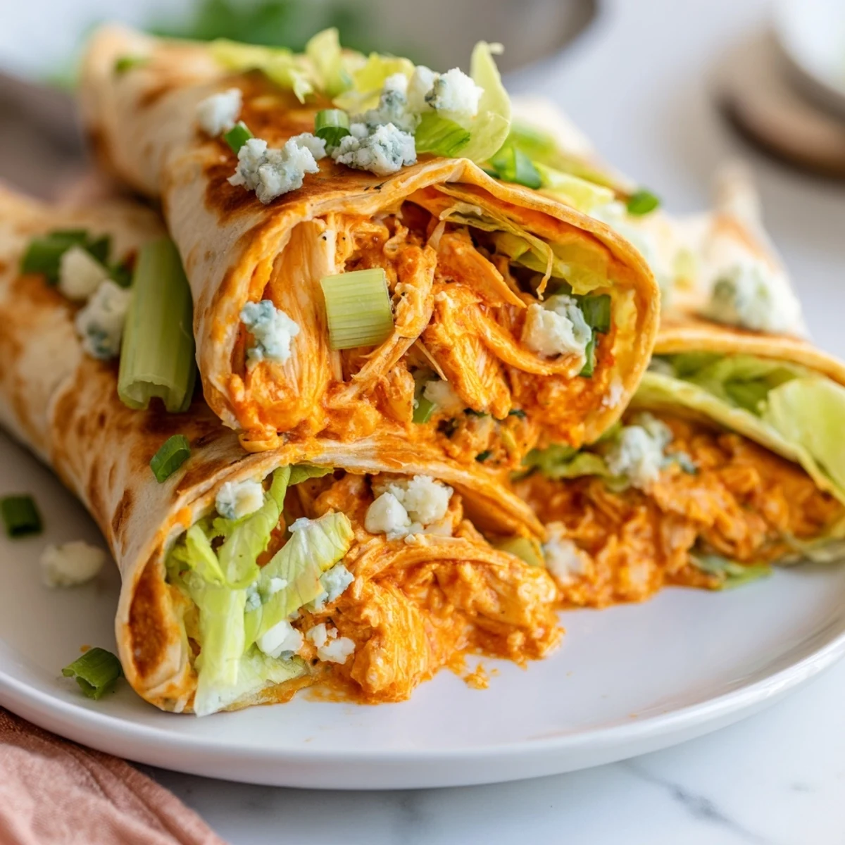 Perfectly assembled buffalo chicken dip wrap, with a crunchy exterior and a flavorful, cheesy filling.
