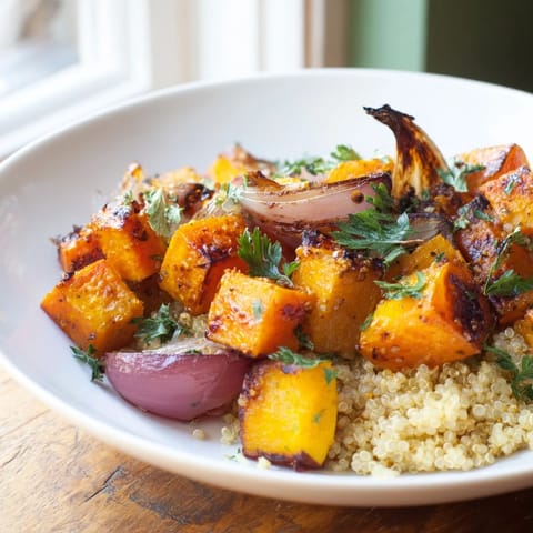 Tender, caramelized vegetables featuring in this healthy and flavorful warm herb bowl recipe.
