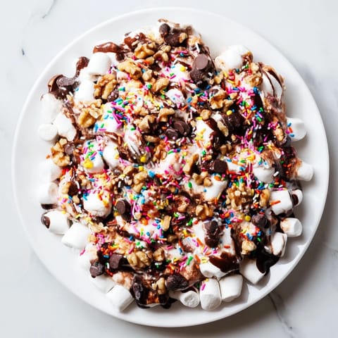 A warm, quick dessert of melted chocolate chips and marshmallows, ready in minutes.