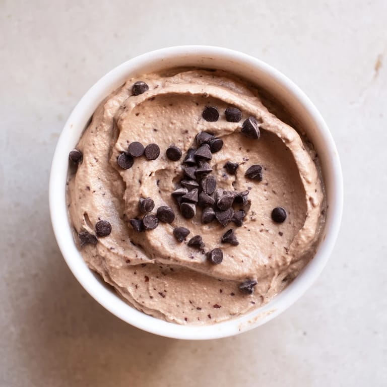 This easy chocolate hummus recipe features a creamy texture, perfect for spreading or dipping.
