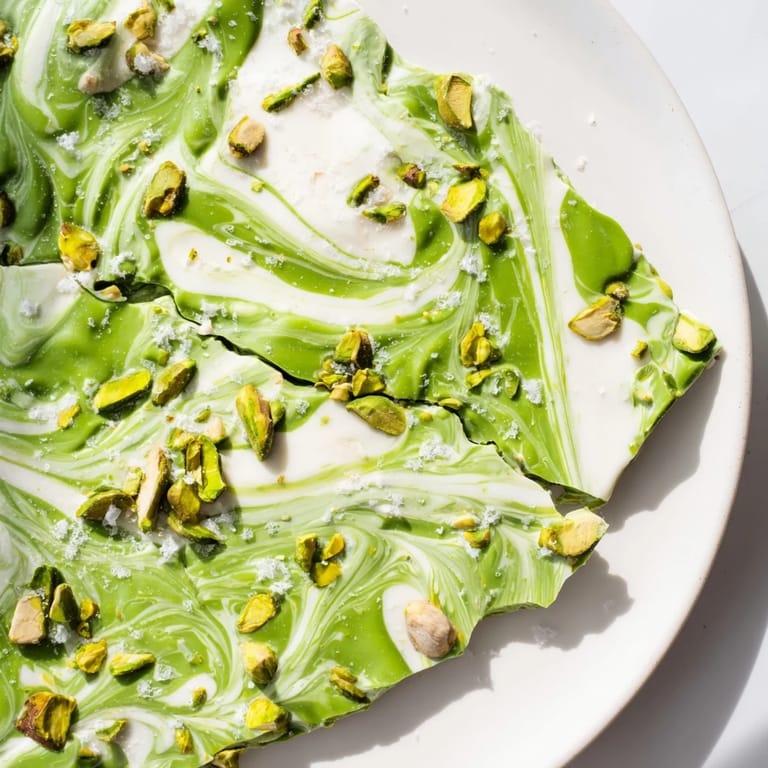 Crystalline white chocolate swirled with matcha and pistachios makes this gorgeous Pistachio Matcha White Chocolate.